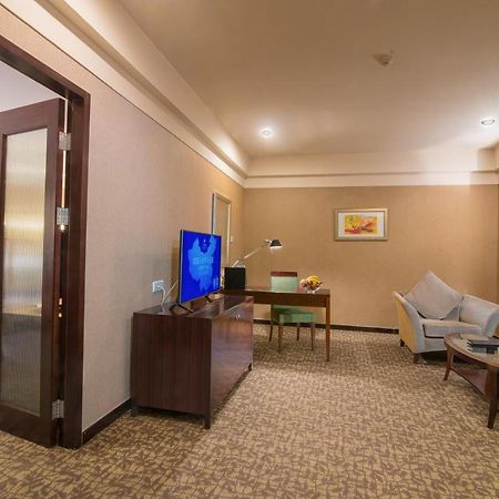 Ruiwan New Century Hotel Tientsin Esterno foto