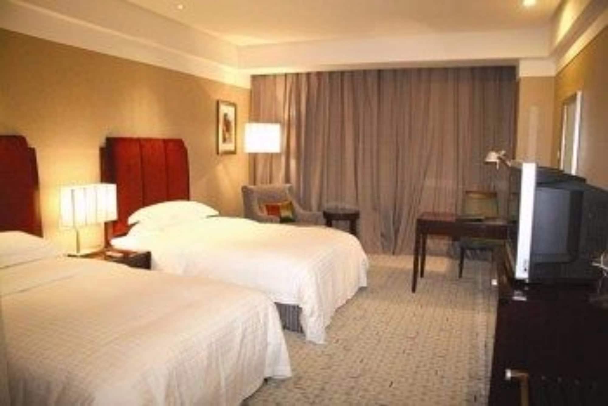 Ruiwan New Century Hotel Tientsin Esterno foto
