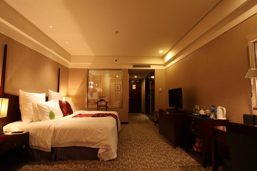 Ruiwan New Century Hotel Tientsin Camera foto