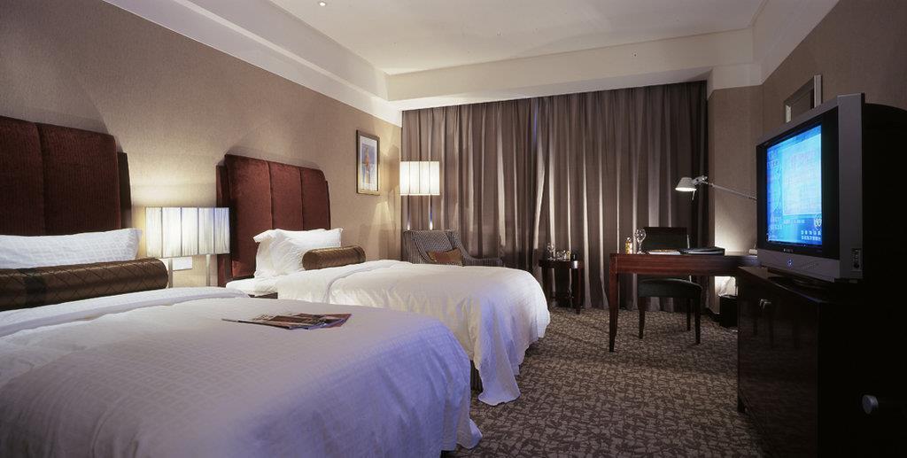 Ruiwan New Century Hotel Tientsin Camera foto